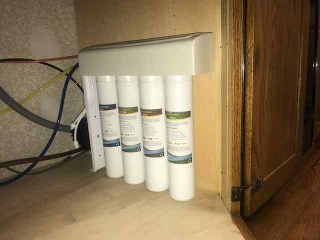Residential water softener installed in a Denver home
